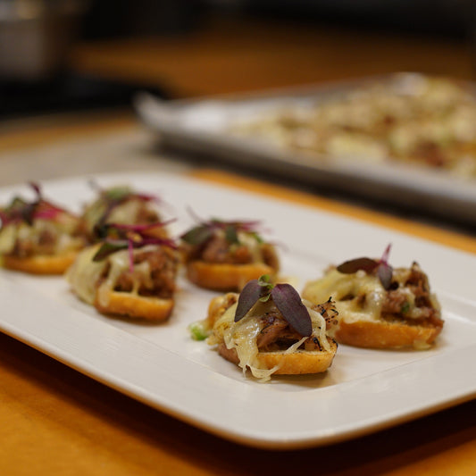 Crostini de canard confit à l'érable gratiné