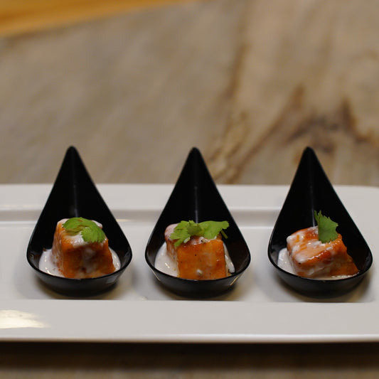 Cuillère de saumon glacé au curry, crème de coco